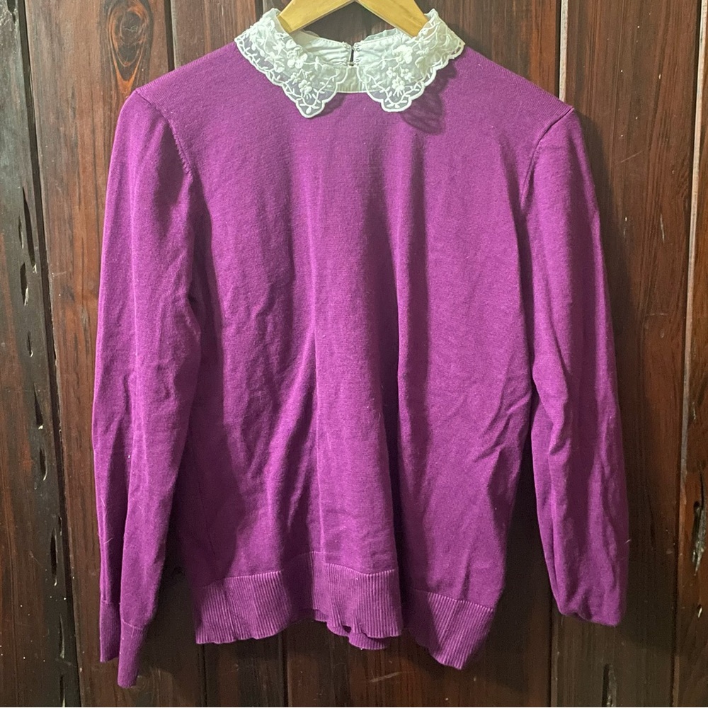 Dark purple sweater with a lace collar